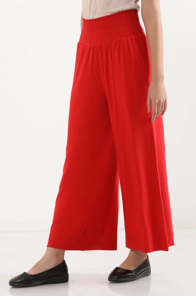 Red Solid Flared Pants With Smocked Waistbelt — photo 3