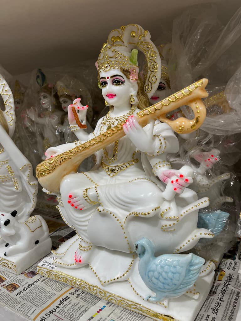 White Statue of Woman Holding a Stick | Sculpture | Porcelain | White
