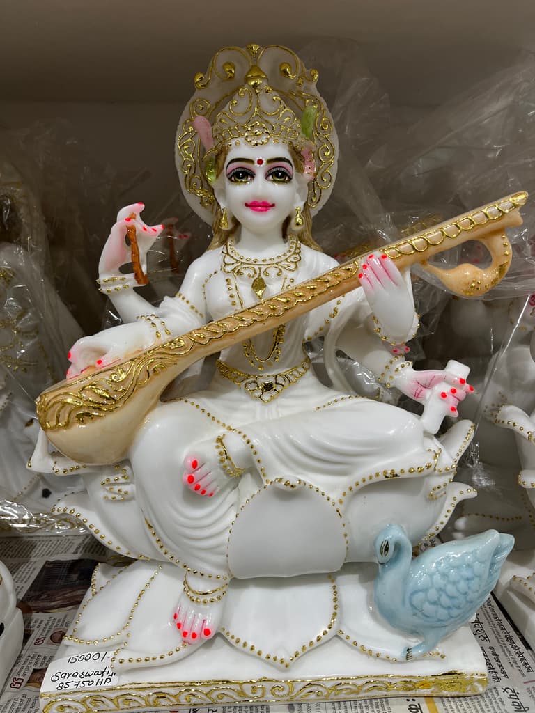 White Statue of Woman Holding a Stick | Sculpture | Porcelain | White