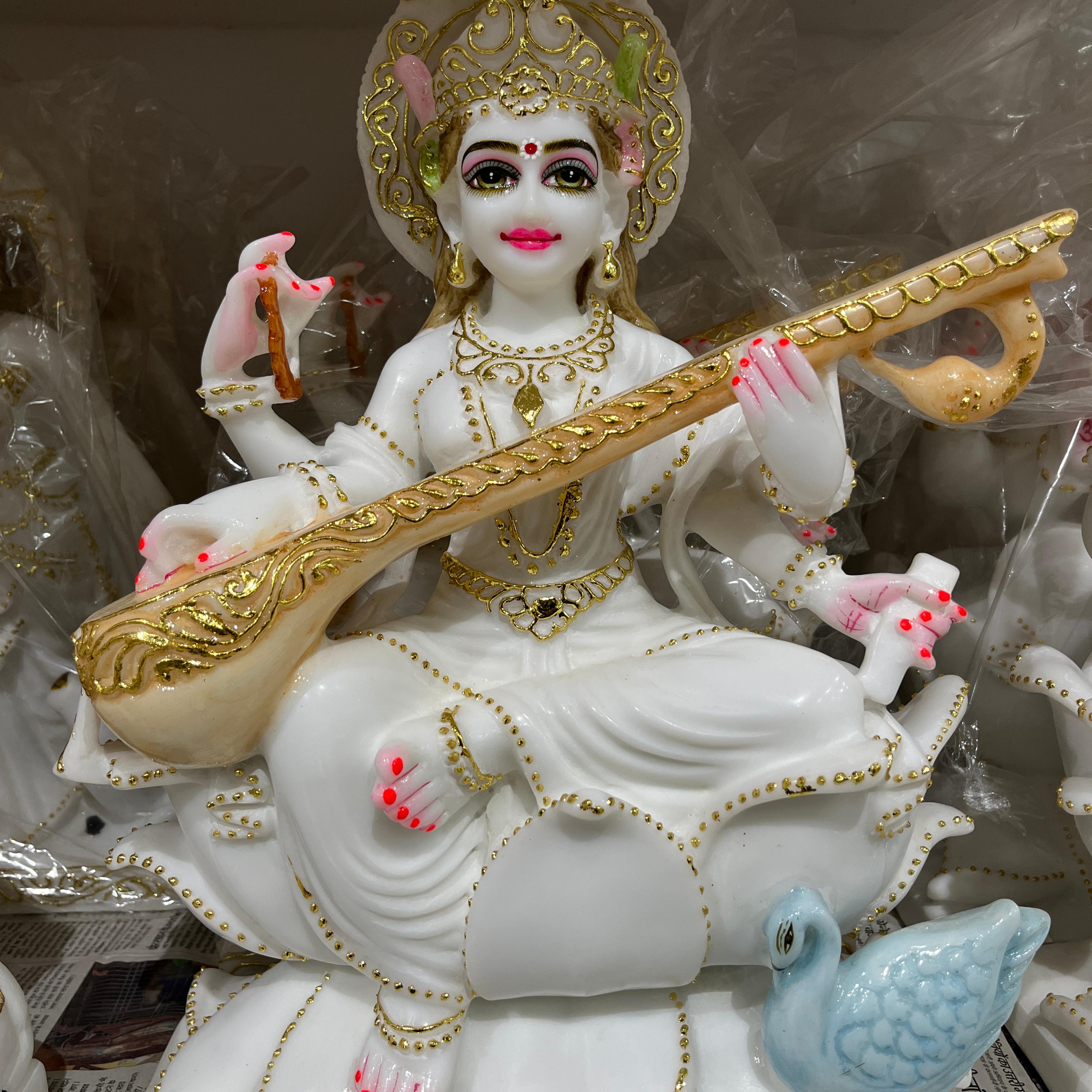 White Statue of Woman Holding a Stick | Sculpture | Porcelain | White
