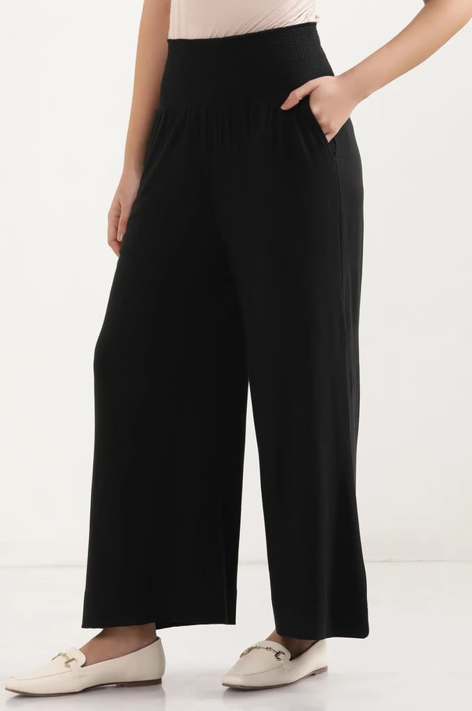 Black Solid Flared Pants With Smocked Waistbelt — photo 3