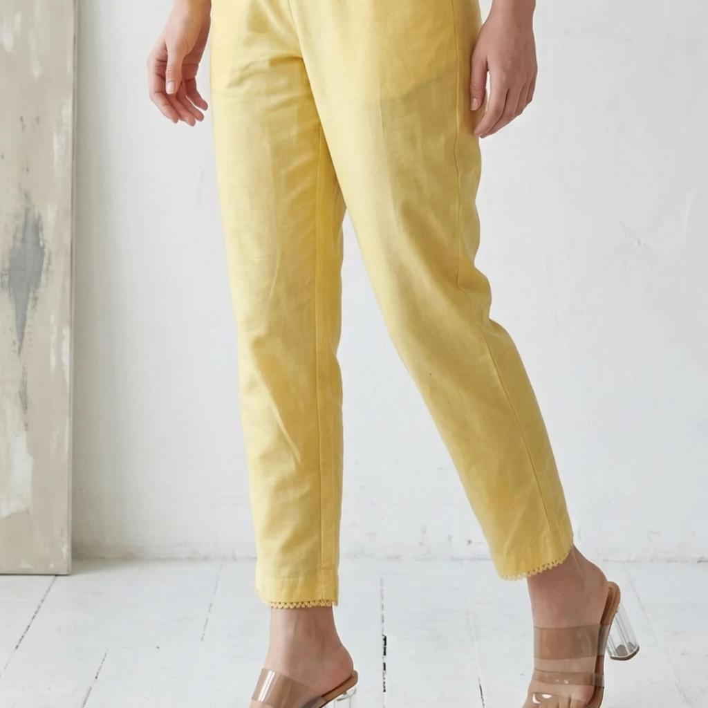 Yellow Solid Straight Fit Pants with Lace