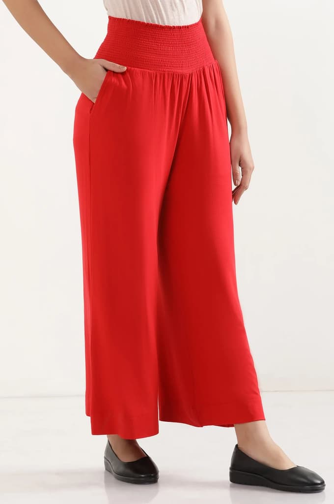 Red Solid Flared Pants With Smocked Waistbelt — photo 5