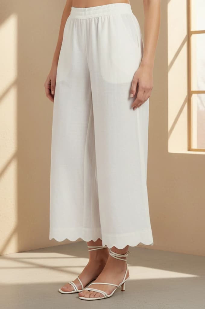 Off White Solid Cut Work Calf Length Flared Pants — photo 3