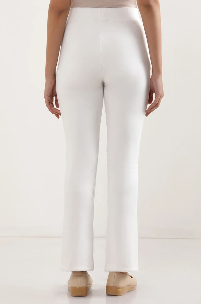 Off White Solid Boot Cut Pants With Elasticated Waist — photo 4