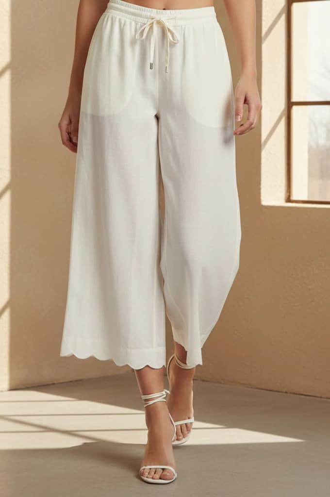 Off White Solid Cut Work Calf Length Flared Pants — photo 2