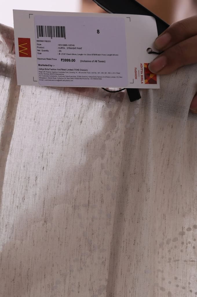 Off White Textured Rayon Blend Flared Kurta with Straight Pants Set — photo 7