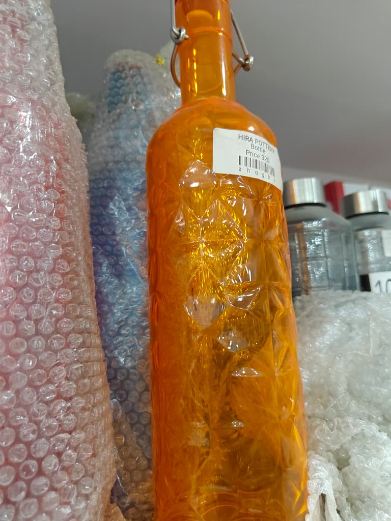 Herra Potette | Oil | Clear | Orange