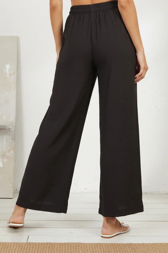 Black Solid Rayon Relaxed Fit Rayon Blend Flared Pants — photo 4