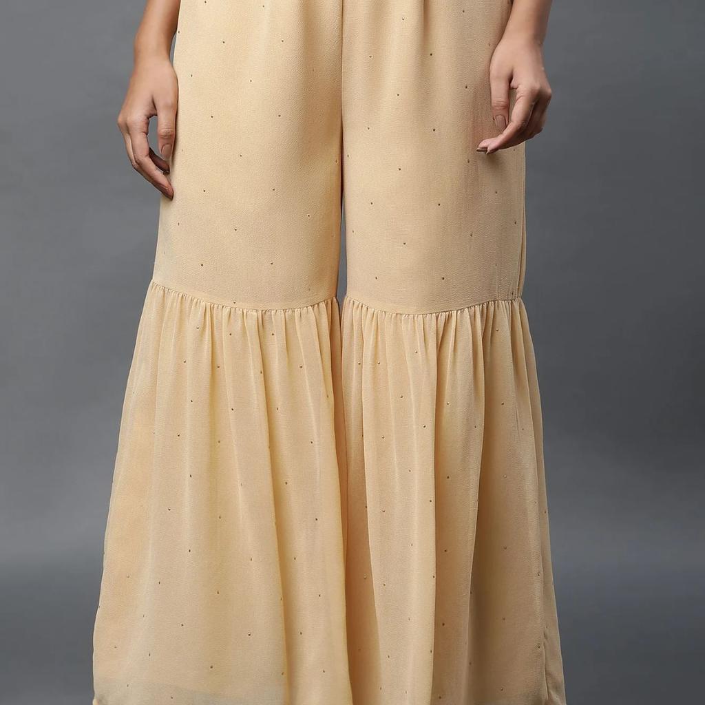 Gold Polka Dots Printed Flared Woven Palazzo With Elasticated Waist