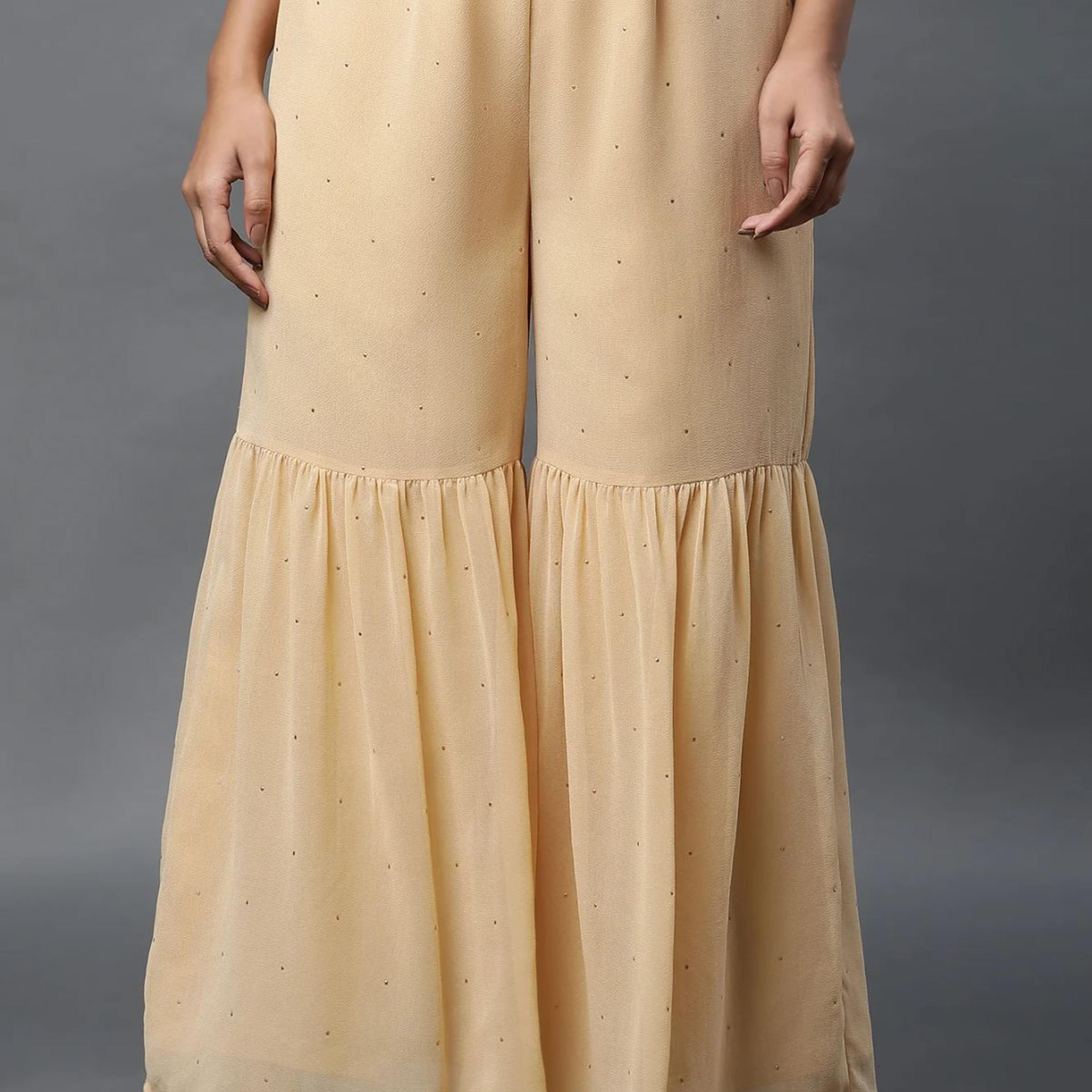 Gold Polka Dots Printed Flared Woven Palazzo With Elasticated Waist