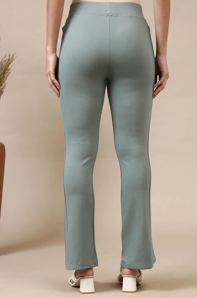 Green Solid Flared High Waisted Yoga Tights With Side Pockets — photo 5
