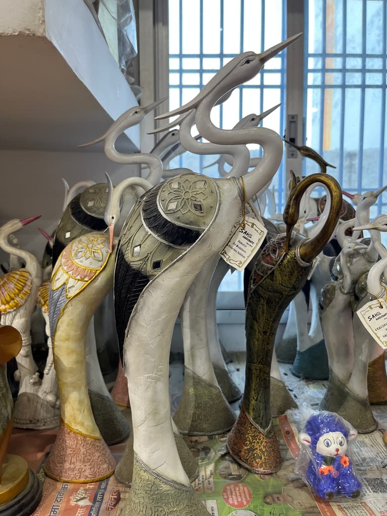 A collection of various animal statues, including a | Unknown | Unknown