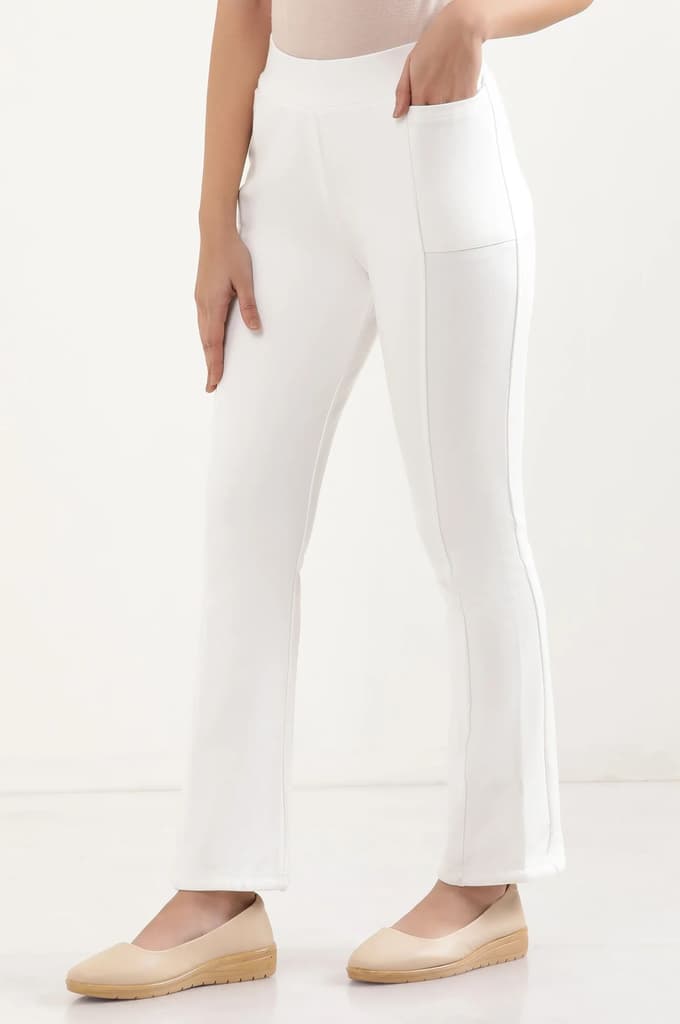 Off White Solid Boot Cut Pants With Elasticated Waist — photo 3