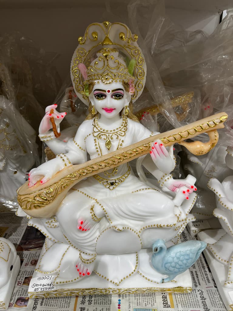 White Statue of Woman Holding a Stick | Sculpture | Porcelain | White