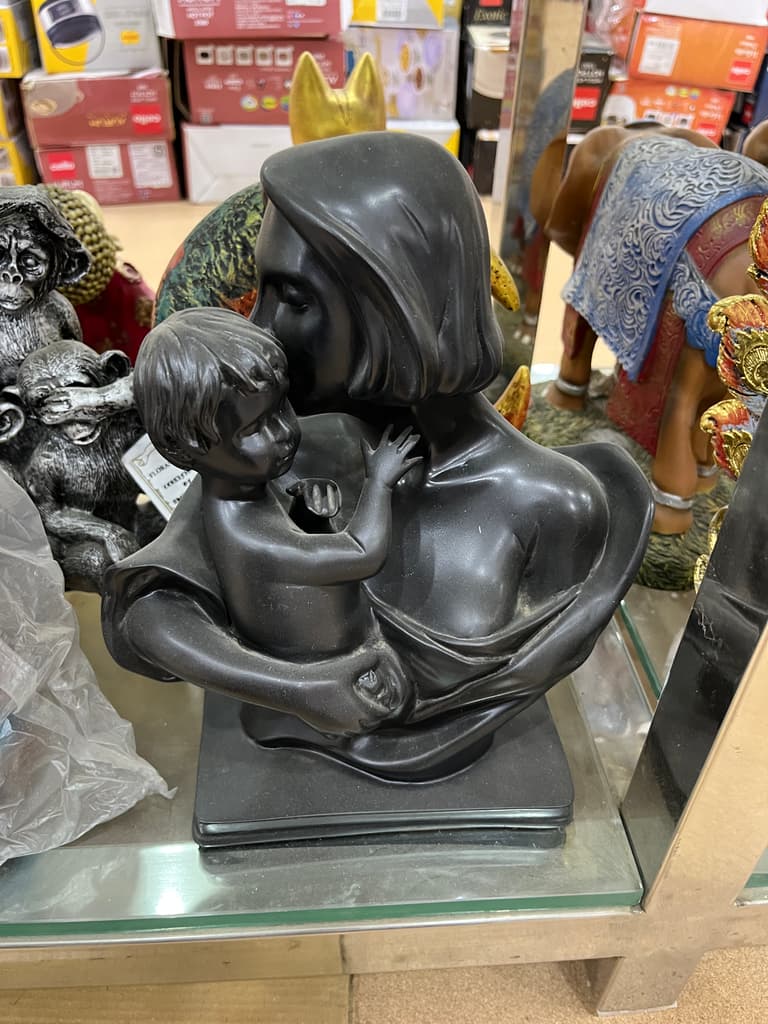Black Statue of a Woman Holding a Baby | Sculpture | Bronze | Black