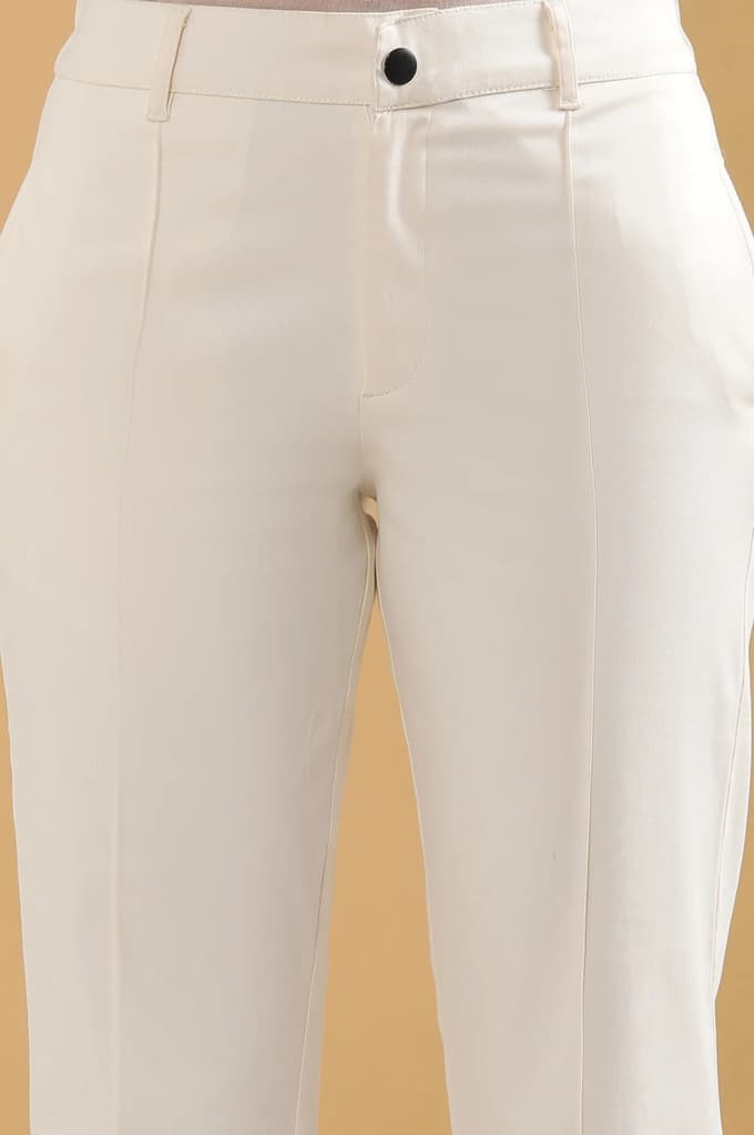Off White Solid Straight Fit Cotton Pants With Pintuck Detail — photo 6