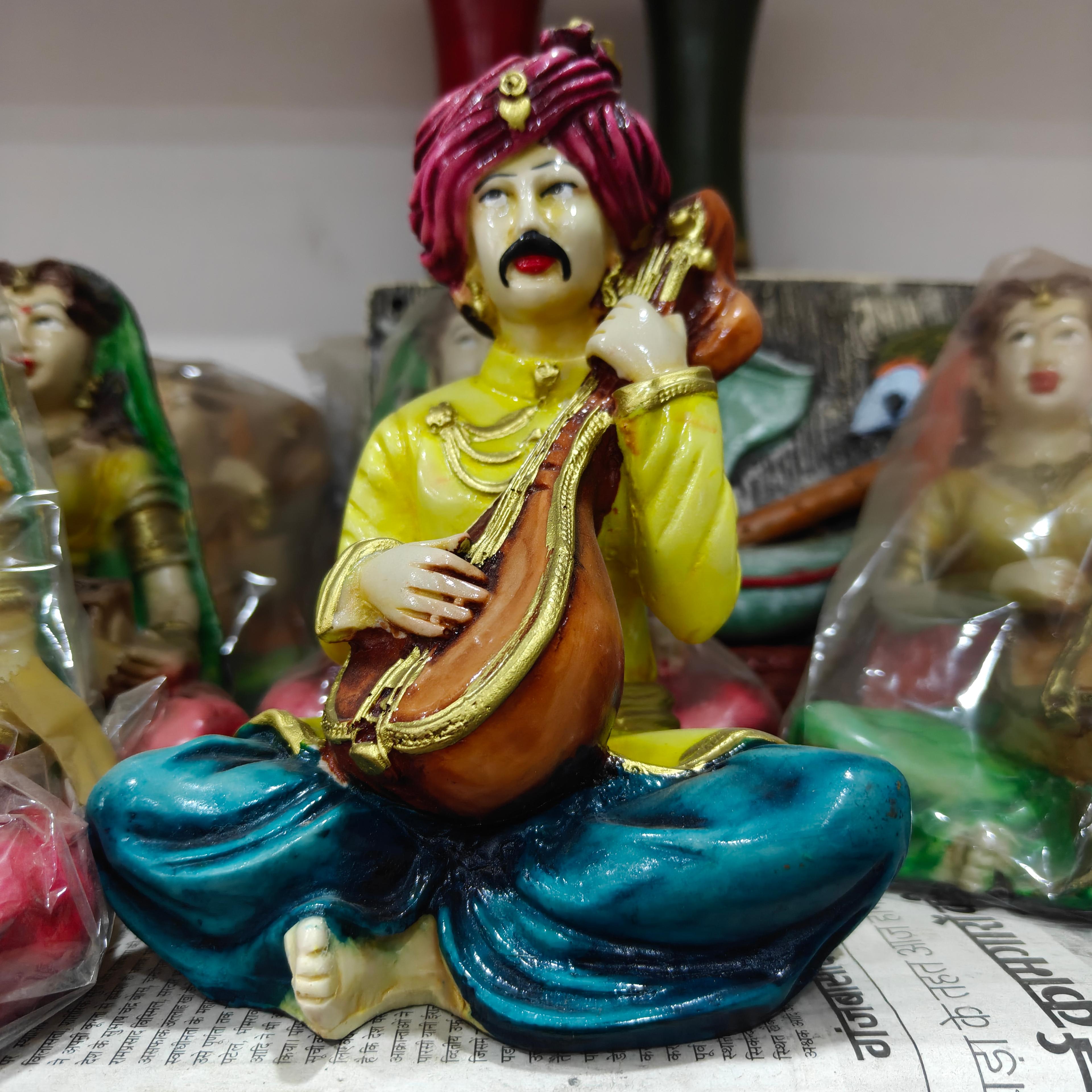 Yellow Statue of Man Playing Sitar | Musical Instrument | Ceramic | Gold