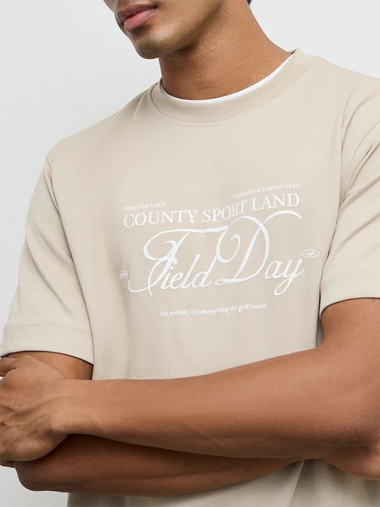 Nuoflexx Beige Text Printed Relaxed-Fit Cotton-Blend T-Shirt — photo 3