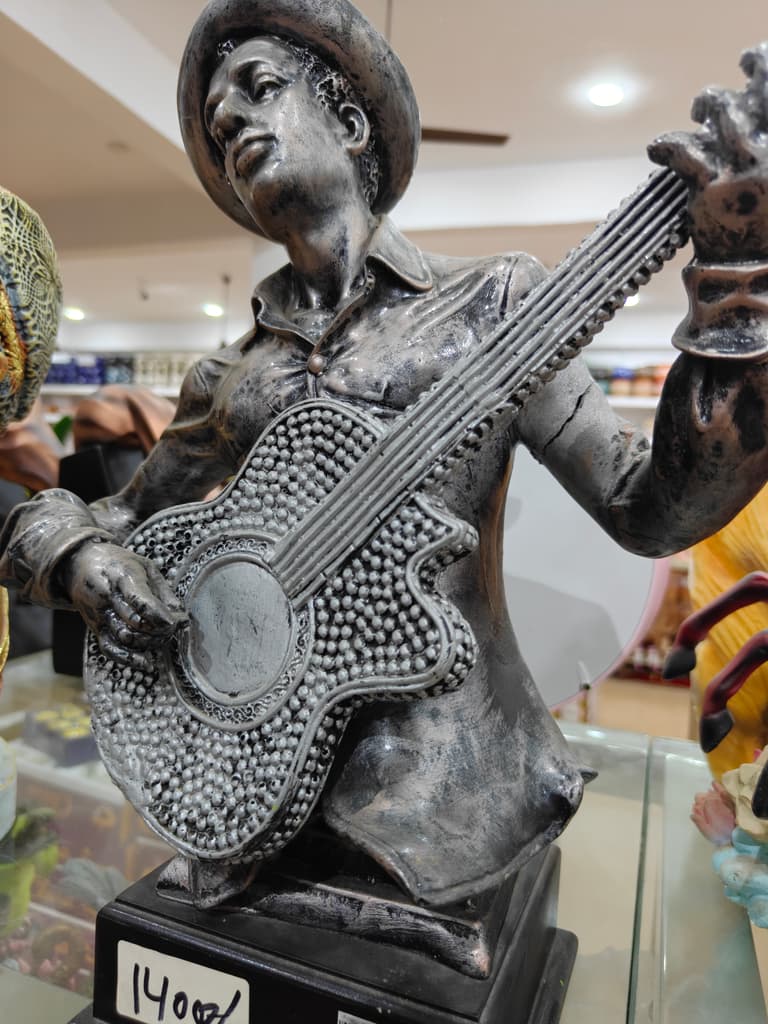 Bronze Statue of a Man Playing Guitar | Sculpture | Bronze | Brown