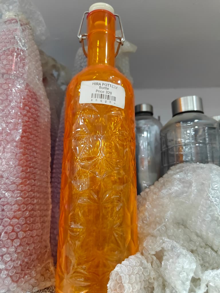 Herra Potette | Oil | Clear | Orange