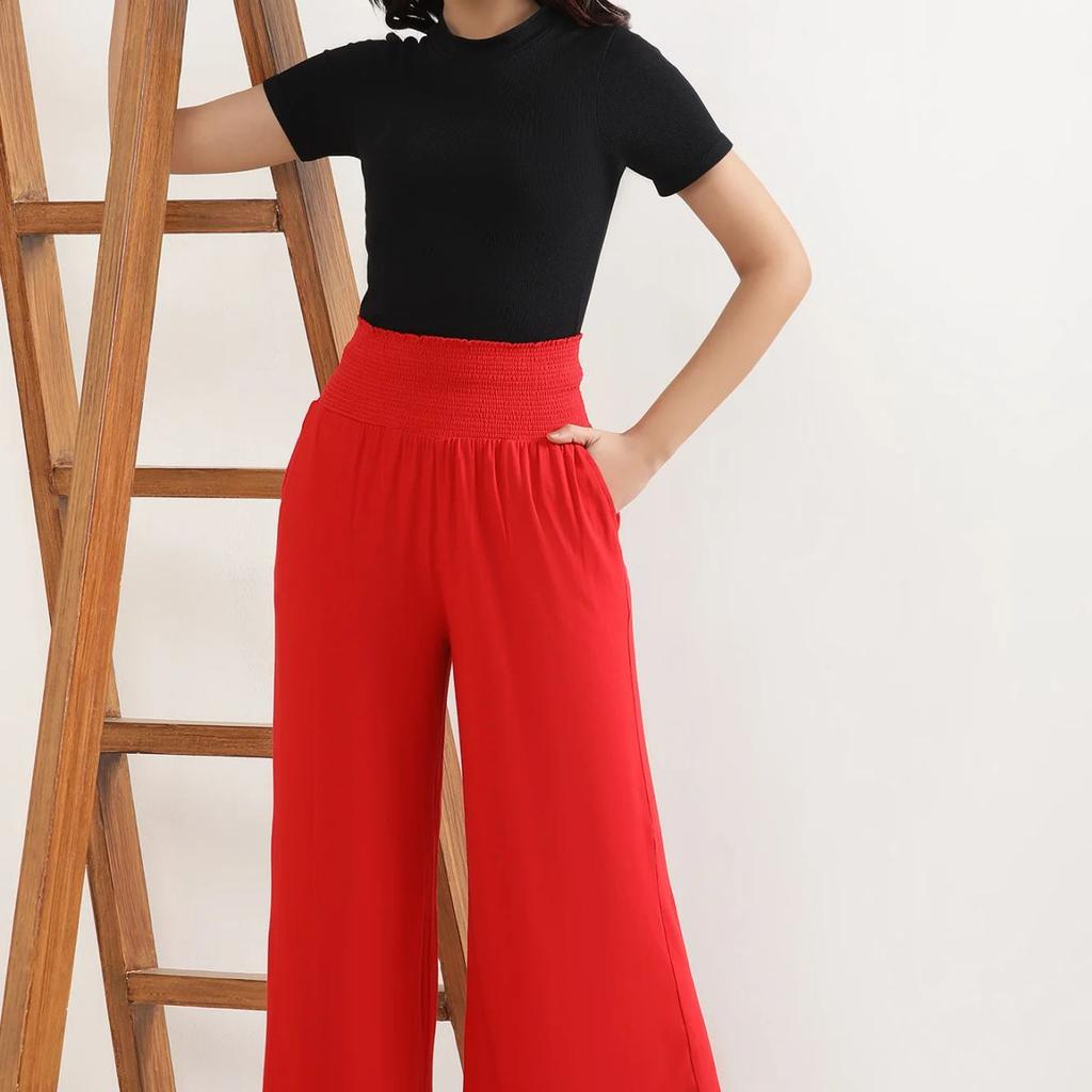Red Solid Flared Pants With Smocked Waistbelt