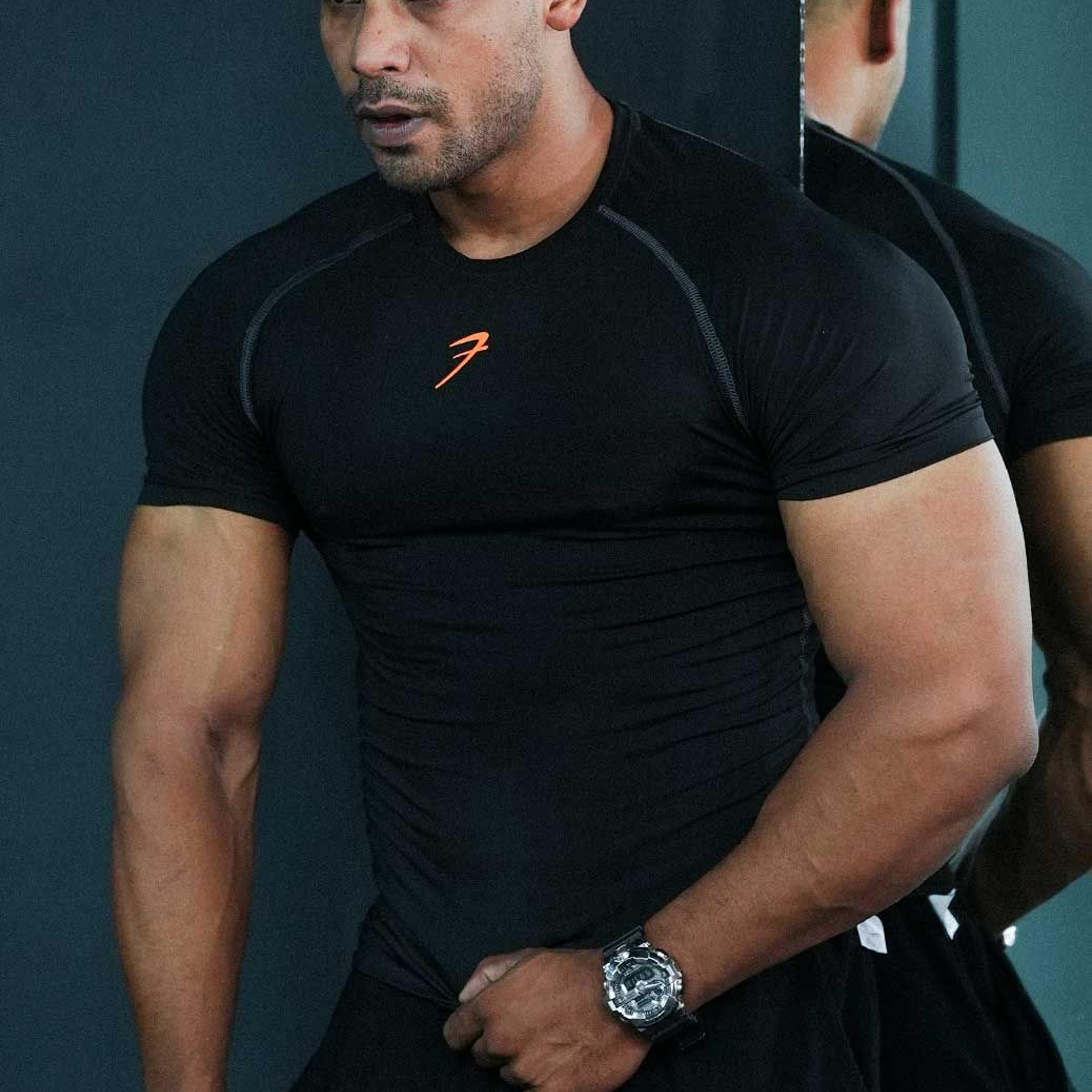 Compression T-shirt Black / Orange Logo