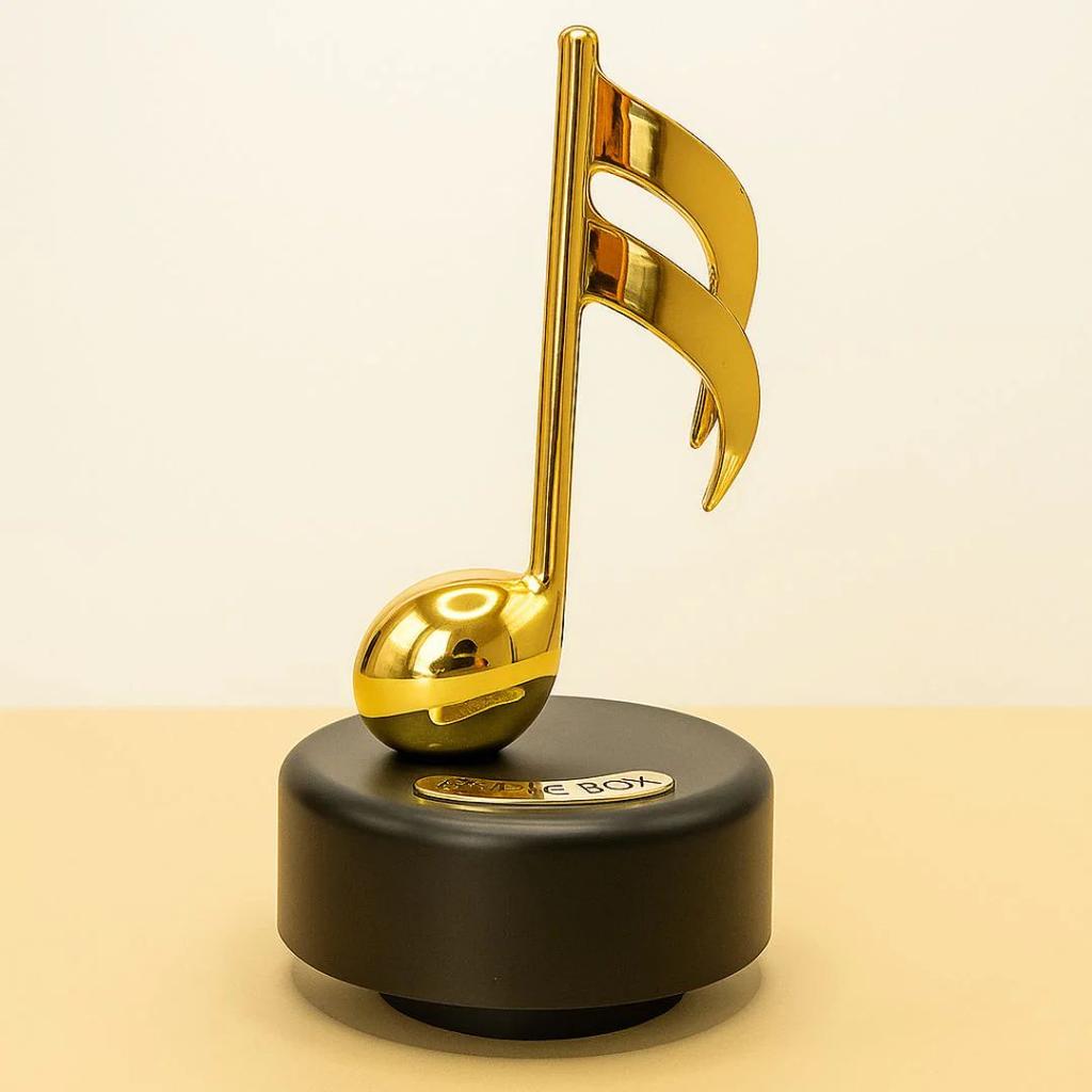 Musical Notes Wind-Up Music Box – Golden Rotating Melody Showpiece for Music Lovers — photo 3