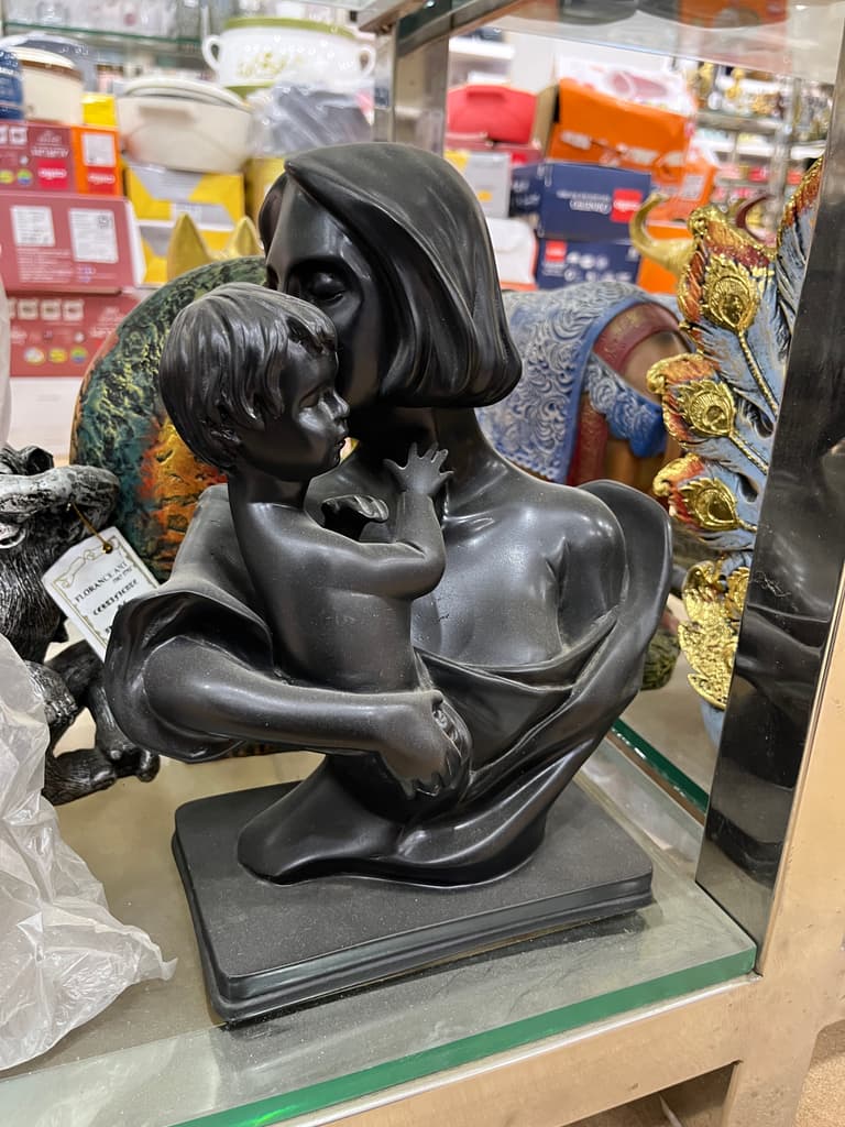 Black Statue of a Woman Holding a Baby | Sculpture | Bronze | Black