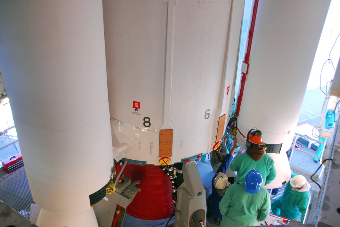 HVAC technician inspecting ductwork