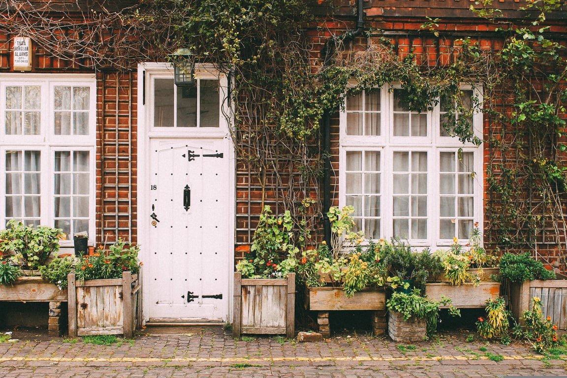handyman repairing exterior door