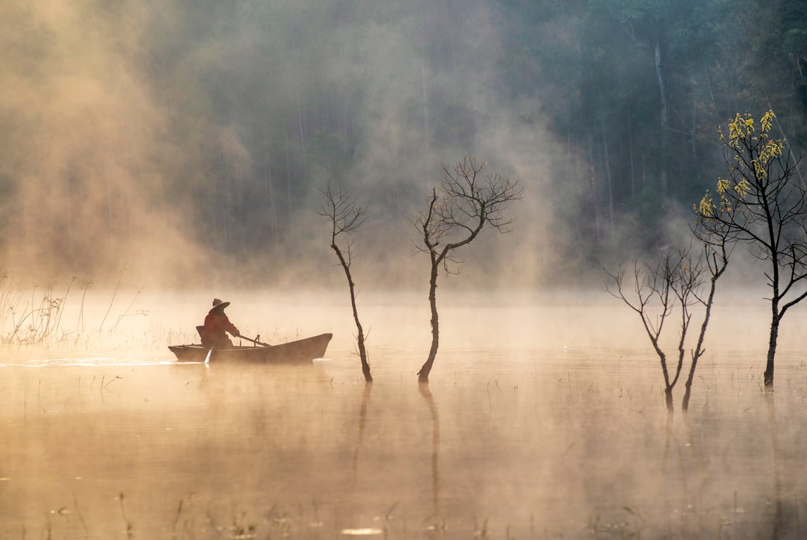 aluminum fishing boat on lake