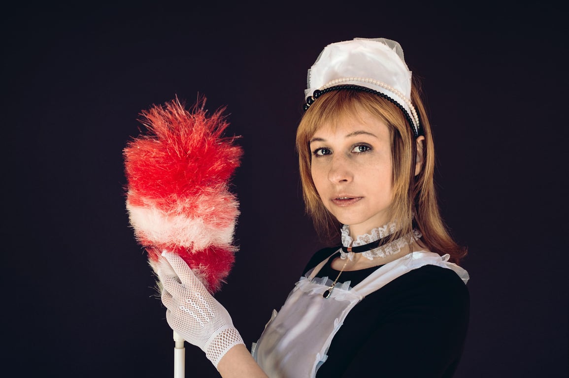 housekeeper cleaning kitchen