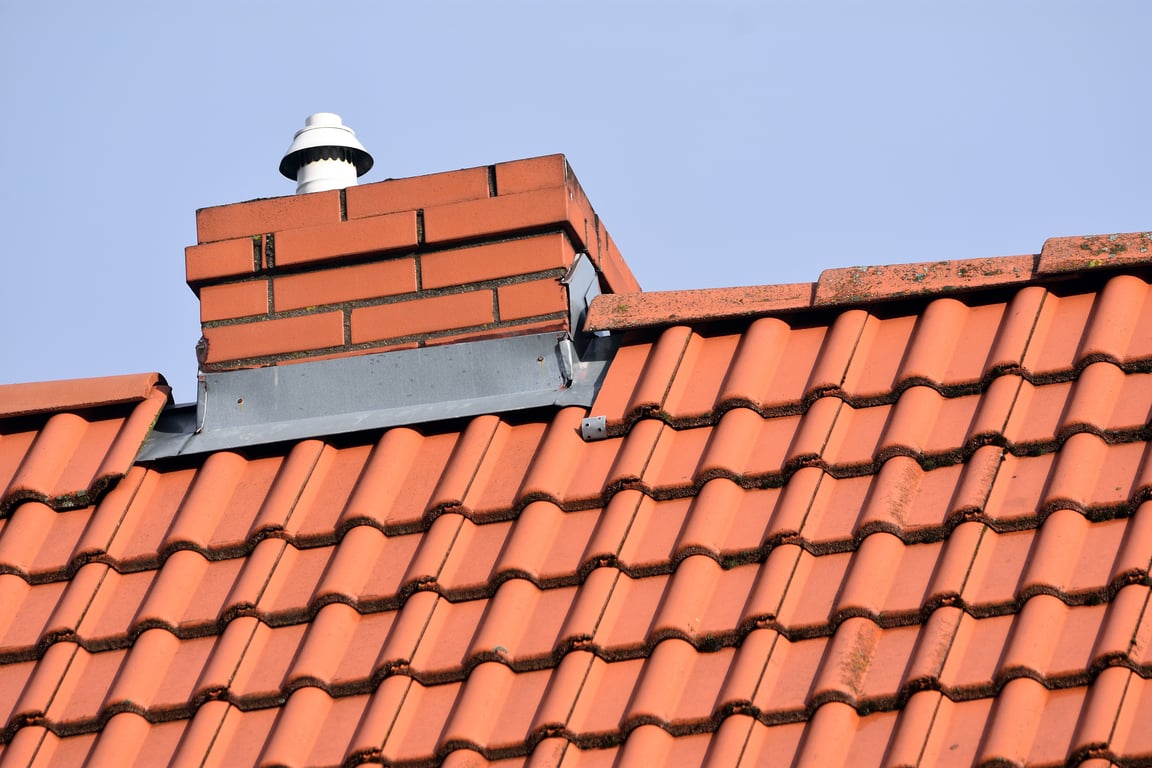 roofer inspecting roof