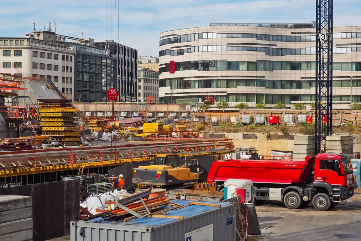 compact track loader on muddy construction site