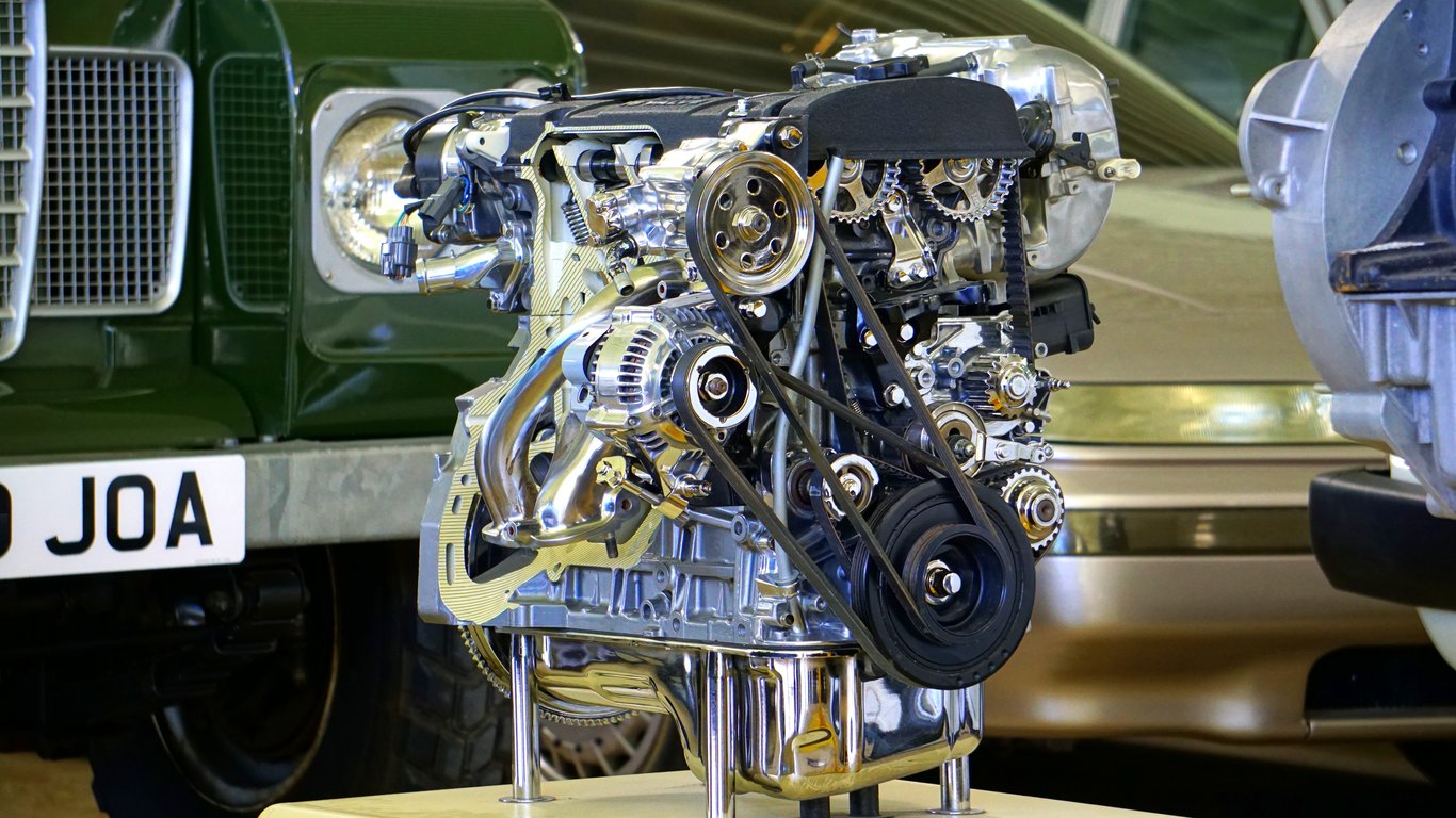 car mechanic inspecting brakes