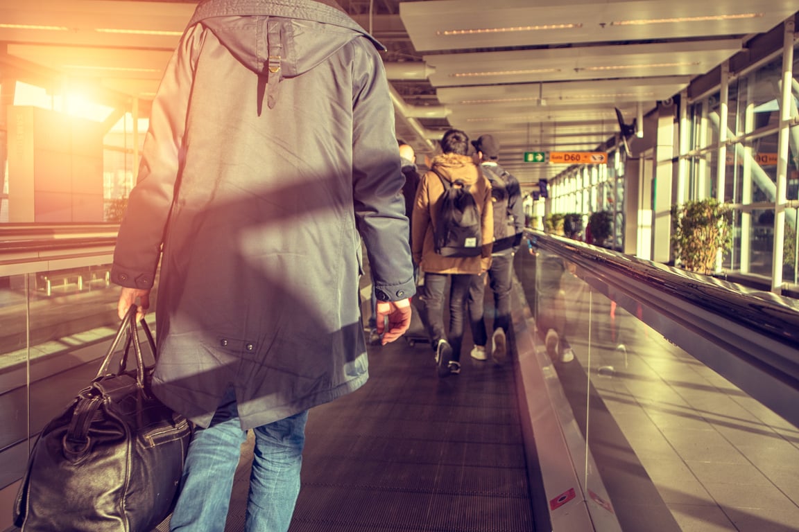 rolling suitcase airport terminal