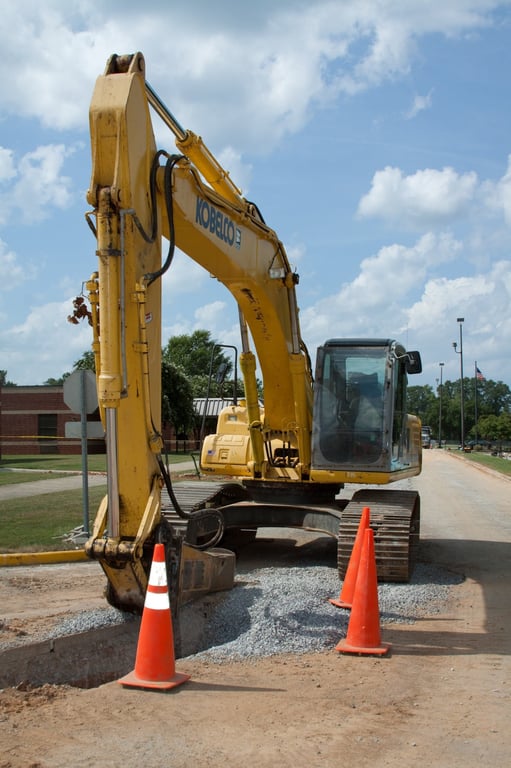 excavator loading dump trucks