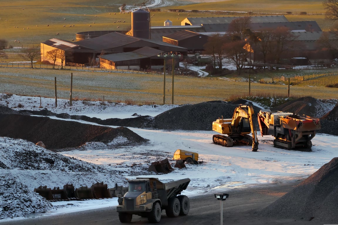 excavator loading dump truck