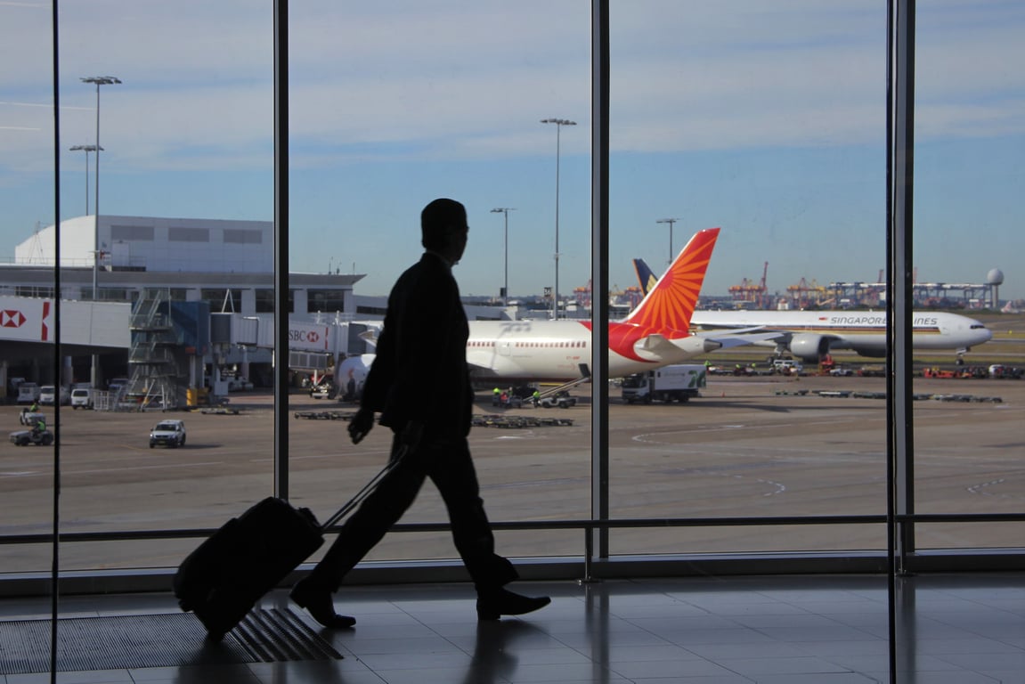 spinner suitcase airport terminal