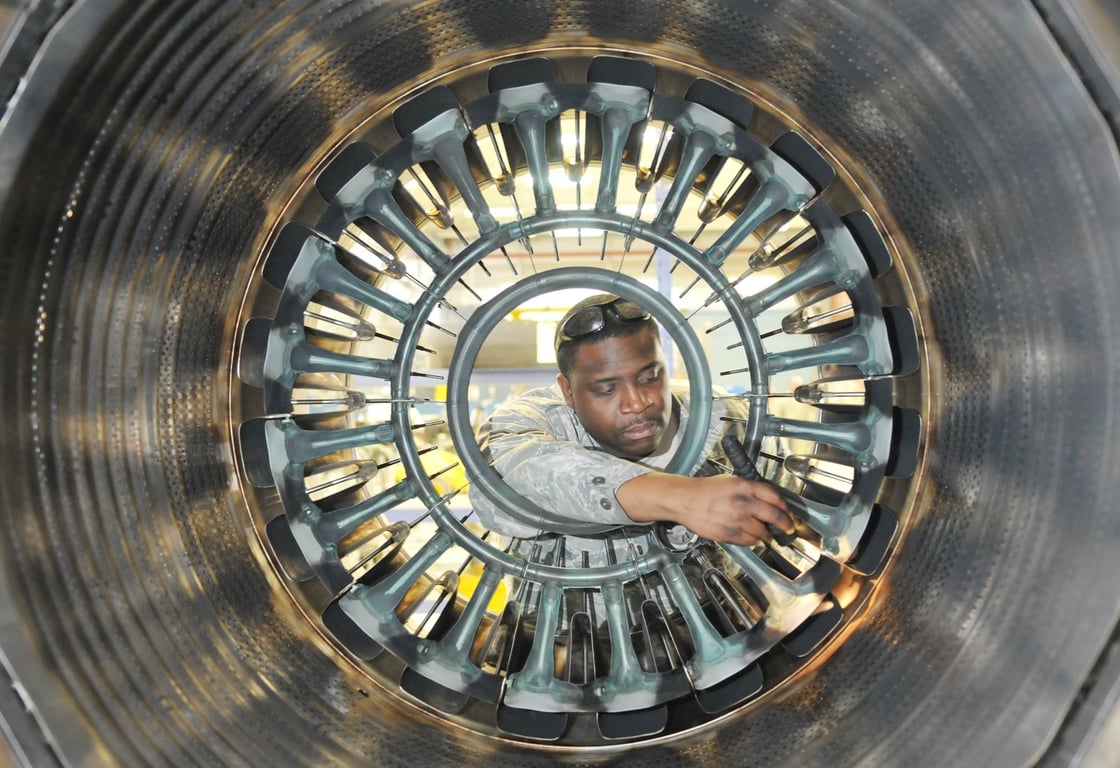 HVAC technician repairing furnace