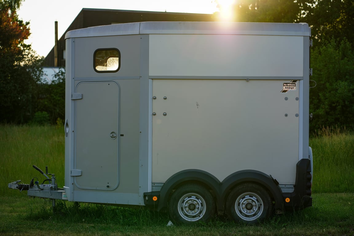 tow truck loading RV trailer
