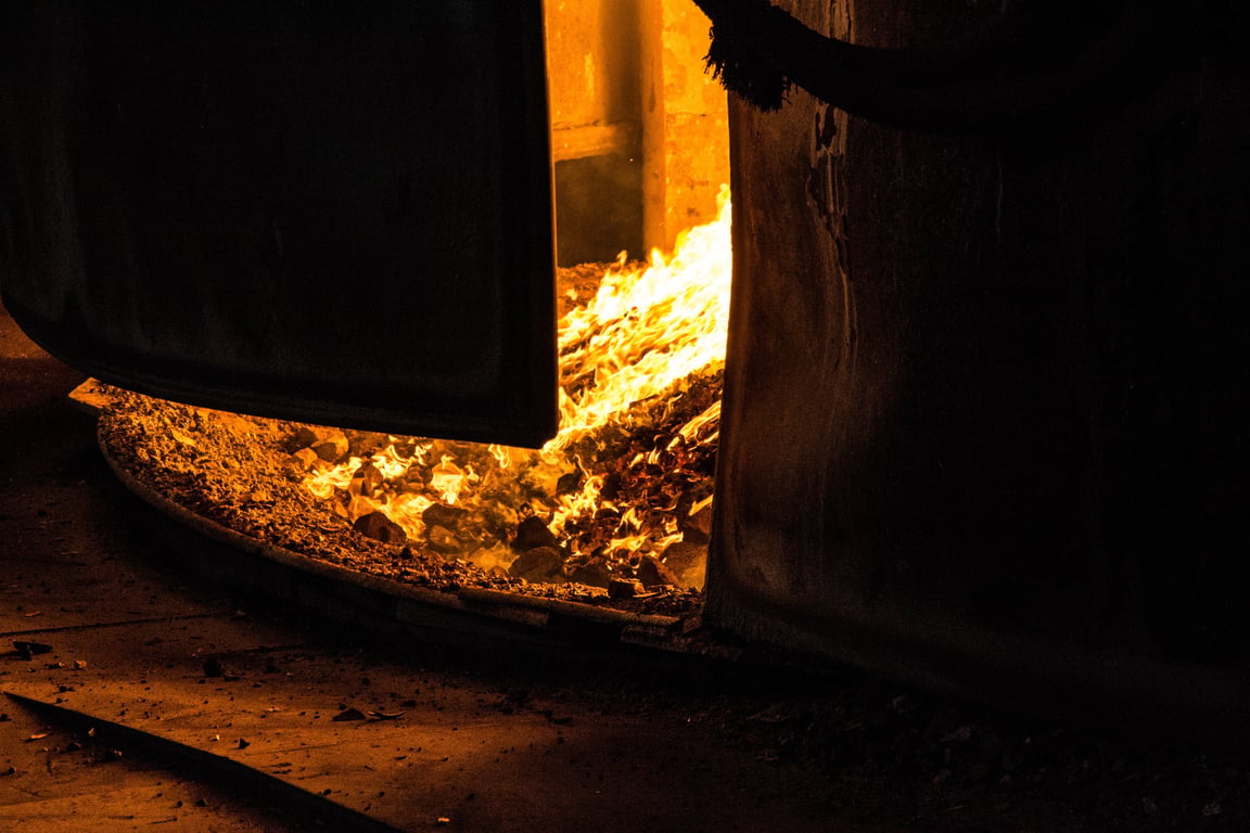 HVAC technician repairing furnace