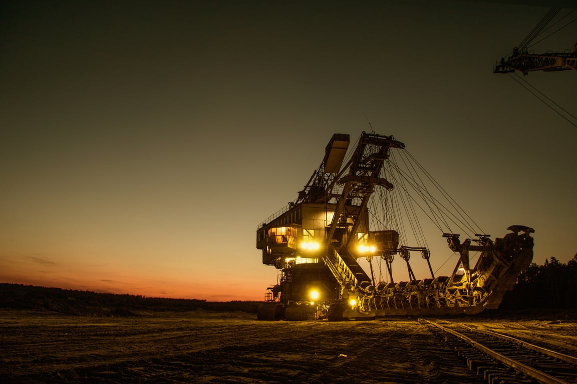 excavator secured on trailer