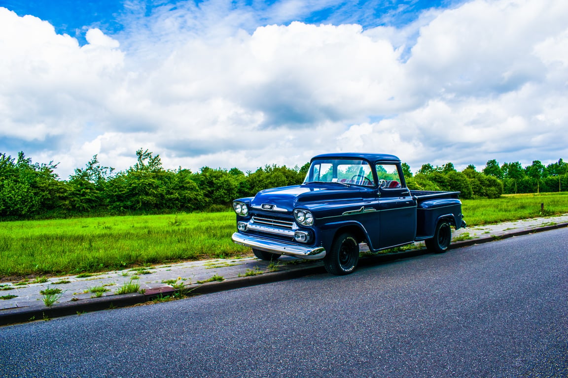pickup truck towing car trailer
