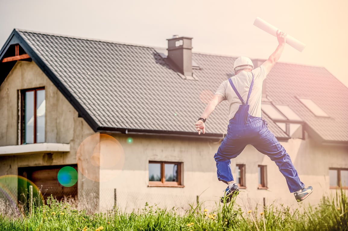 home renovation contractor inspecting house