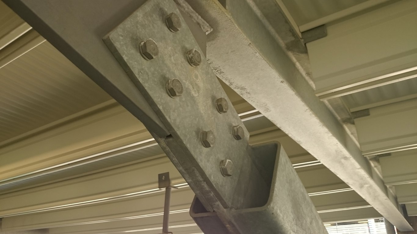 hail-damaged metal roof