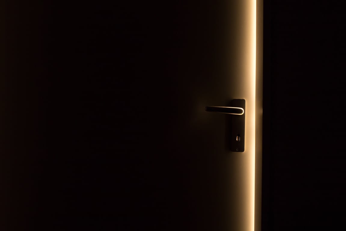handyman repairing interior door