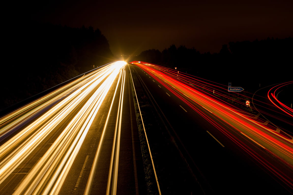 nighttime tow truck highway
