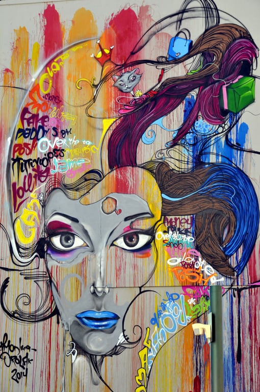 colorful mural wall group photo